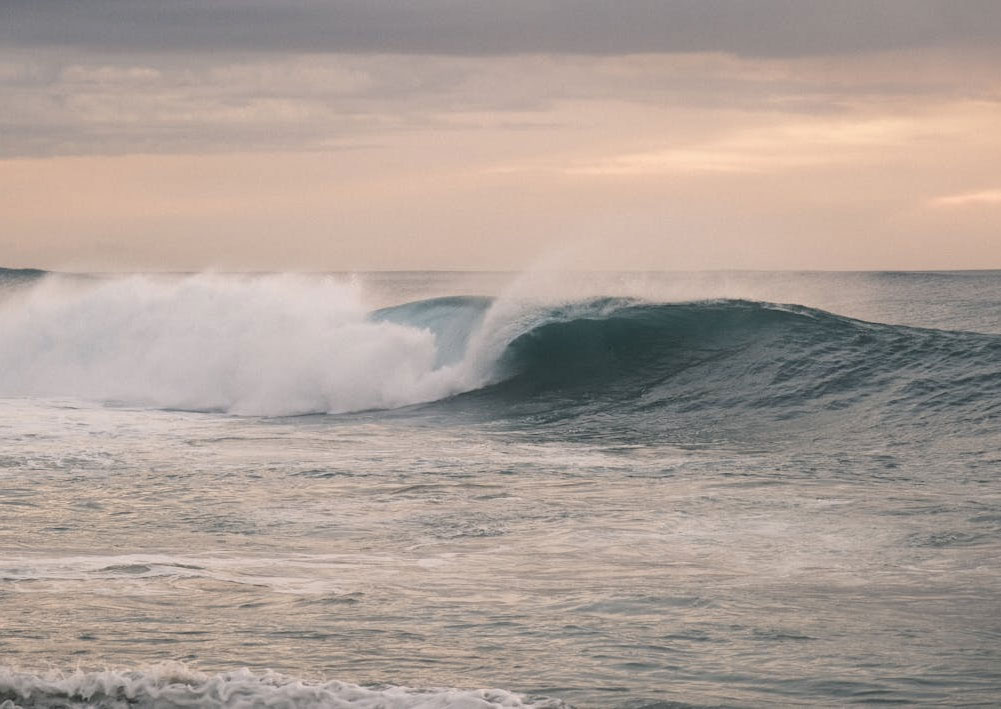 PEXEL-serene-ocean-wave-at-sunset-31017412-