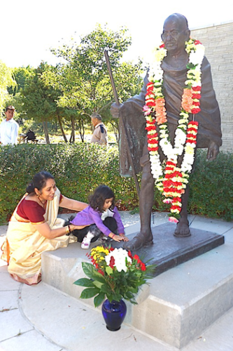 05 Rayva touching Gandhiji's feet